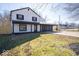 Attractive exterior elevation showcasing a two-story home with an attached two car garage at 1808 Raible Ave, Anderson, IN 46011