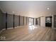 This is a large living room with multiple entry points at 1808 Raible Ave, Anderson, IN 46011