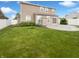 Spacious backyard featuring a patio and a well-manicured lawn at 18230 Sandy Cove Ln, Westfield, IN 46074