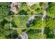 Aerial view of the property showcasing its expansive lot and mature tree coverage at 2120 Wynnedale Rd, Indianapolis, IN 46228