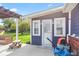 A cozy back patio is located off the house, featuring a seating area and room for activities at 2309 Alexandria Dr, Greenfield, IN 46140