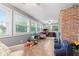 Sunroom with natural light, neutral tones, tile flooring, and ample space for various activities at 2309 Alexandria Dr, Greenfield, IN 46140