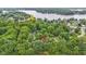 Aerial view of a property surrounded by lush greenery, showcasing its location and neighborhood at 2397 Lincoln Dr, Cicero, IN 46034