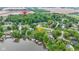 Breathtaking aerial view of lakeside homes with private boat docks surrounded by lush greenery, offering serene waterfront living at 2397 Lincoln Dr, Cicero, IN 46034