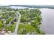 Aerial view of waterfront homes showcasing the community near the water and lush landscaping at 2397 Lincoln Dr, Cicero, IN 46034