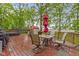 Relaxing back deck with outdoor seating and a hot tub, perfect for enjoying the backyard view at 2397 Lincoln Dr, Cicero, IN 46034