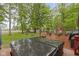 The home's expansive back yard features a large deck with a hot tub and a fire pit at 2397 Lincoln Dr, Cicero, IN 46034