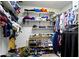 Walk-in closet with multiple shelves, hanging racks, and ample space for clothing and shoe storage at 2397 Lincoln Dr, Cicero, IN 46034