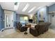 Bright living room featuring skylights, fireplace, and comfortable seating arrangements at 2397 Lincoln Dr, Cicero, IN 46034
