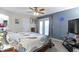Comfortable main bedroom with ceiling fan and a door to the outdoor deck at 2397 Lincoln Dr, Cicero, IN 46034