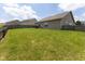 A spacious, flat backyard offers ample green space, perfect for outdoor activities and relaxation at 2717 Arklow Way, Brownsburg, IN 46112