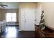Welcoming foyer featuring beautiful wood flooring and a decorative console table at 2717 Arklow Way, Brownsburg, IN 46112