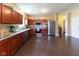 Spacious kitchen boasts stainless steel appliances, ample cabinet space, and stone countertops at 2717 Arklow Way, Brownsburg, IN 46112
