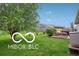 Spacious backyard with a lush green lawn, seating on a deck, and ample room for outdoor activities and enjoyment at 2911 W Hawanian Ln, Monrovia, IN 46157