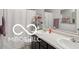 This bathroom offers double sinks, a shower and plenty of storage at 2911 W Hawanian Ln, Monrovia, IN 46157