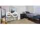 Comfortable bedroom featuring a desk, plush carpet, and ample natural light at 2911 W Hawanian Ln, Monrovia, IN 46157