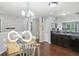 Bright dining area flowing into the kitchen, perfect for casual Gathering meals at 2911 W Hawanian Ln, Monrovia, IN 46157