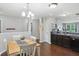 Dining room featuring hardwood floors, lots of natural light, and an open concept at 2911 W Hawanian Ln, Monrovia, IN 46157