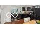 Well-equipped kitchen boasts dark cabinetry, sleek countertops, and modern black appliances at 2911 W Hawanian Ln, Monrovia, IN 46157