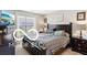 Relaxing main bedroom filled with natural light, featuring a cozy bed and tasteful decor at 2911 W Hawanian Ln, Monrovia, IN 46157