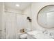 Bathroom featuring a vanity, shower with curtain and round mirror at 2956 N 700 E, Franklin, IN 46131