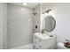 Modern bathroom with stand-up shower, subway tile, sink with vanity and overhead lighting at 2956 N 700 E, Franklin, IN 46131