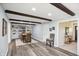 Bright dining room featuring modern table and chairs, wood beams, and modern flooring at 2956 N 700 E, Franklin, IN 46131