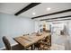 Spacious dining room with hardwood floors and wooden dining table for six at 2956 N 700 E, Franklin, IN 46131