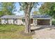 Charming single-story home with brick exterior, new roof, mature trees, and fresh landscaping at 2956 N 700 E, Franklin, IN 46131