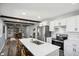 Bright kitchen featuring stainless steel appliances, white cabinets, a breakfast bar, and modern finishes at 2956 N 700 E, Franklin, IN 46131