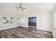 Open-concept living room leading to the dining room, featuring hardwood floors at 2956 N 700 E, Franklin, IN 46131