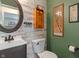 Charming half-bathroom featuring shiplap walls, updated vanity, and decorative accents at 3631 S 450 E, Whitestown, IN 46075