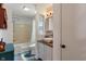 Charming bathroom features a shower over tub, vanity with vessel sink, and vintage style fixtures at 3631 S 450 E, Whitestown, IN 46075