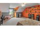 Bedroom featuring sloped ceilings, carpeted floor, and shelving for ample storage at 3631 S 450 E, Whitestown, IN 46075