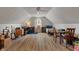 Cozy bedroom featuring a sloped ceiling, desk, bed, and a ceiling fan at 3631 S 450 E, Whitestown, IN 46075