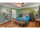 Bright bedroom with a view to the ensuite bathroom, warm decor, and natural light at 3631 S 450 E, Whitestown, IN 46075