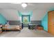 Spacious bedroom with sloped ceilings, ceiling fan, and large window for plenty of natural light at 3631 S 450 E, Whitestown, IN 46075
