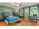 Bright bedroom with a large window, charming decor, and warm, natural light at 3631 S 450 E, Whitestown, IN 46075