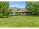 Charming home featuring a well-manicured lawn, inviting front porch and lovely landscaping at 3631 S 450 E, Whitestown, IN 46075
