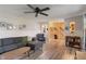 Cozy living room showcasing a stylish sofa and access to other rooms at 3631 S 450 E, Whitestown, IN 46075