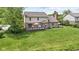 Spacious backyard with a large deck perfect for outdoor entertaining with a view of the lake at 3708 Gould Dr, Carmel, IN 46033