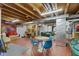 Unfinished basement featuring exposed ductwork, wood beams, and living and storage areas at 3708 Gould Dr, Carmel, IN 46033