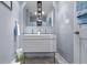Modern bathroom featuring a contemporary sink and a sleek vanity, complemented by a stylish mirror at 3708 Gould Dr, Carmel, IN 46033
