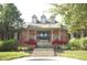 Charming brick clubhouse with well-maintained landscaping and inviting entrance at 3708 Gould Dr, Carmel, IN 46033