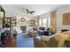 Inviting living room boasts a fireplace, custom built-ins, and hardwood floors, creating a warm and elegant atmosphere at 3708 Gould Dr, Carmel, IN 46033