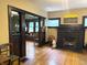 Comfortable living room features hardwood floors, large windows and inviting seating, creating a relaxing ambiance at 3745 Winthrop Ave, Indianapolis, IN 46205