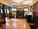 Cozy living room features wood floors, fireplace with views into a reading room creating a warm atmosphere at 3745 Winthrop Ave, Indianapolis, IN 46205