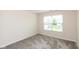 Bedroom with neutral carpet, white base trim, window with shade at 3980 Railhead Ave, Westfield, IN 46074