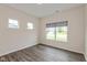 Bright room with hardwood flooring and large windows at 3980 Railhead Ave, Westfield, IN 46074