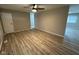 Bright living room with modern flooring and a ceiling fan at 4108 Steinmetz Dr, Indianapolis, IN 46254